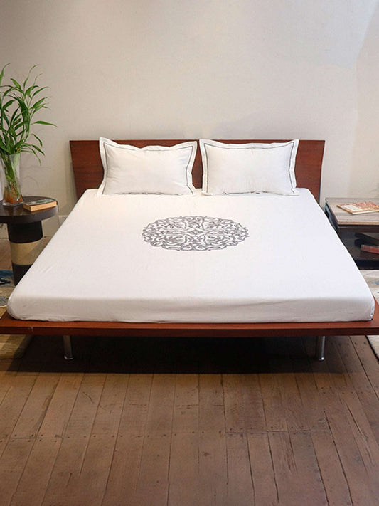 white colored embroidered soft bedsheet with 2 matching pillow covers made from 100% pure cotton for king size double bed
