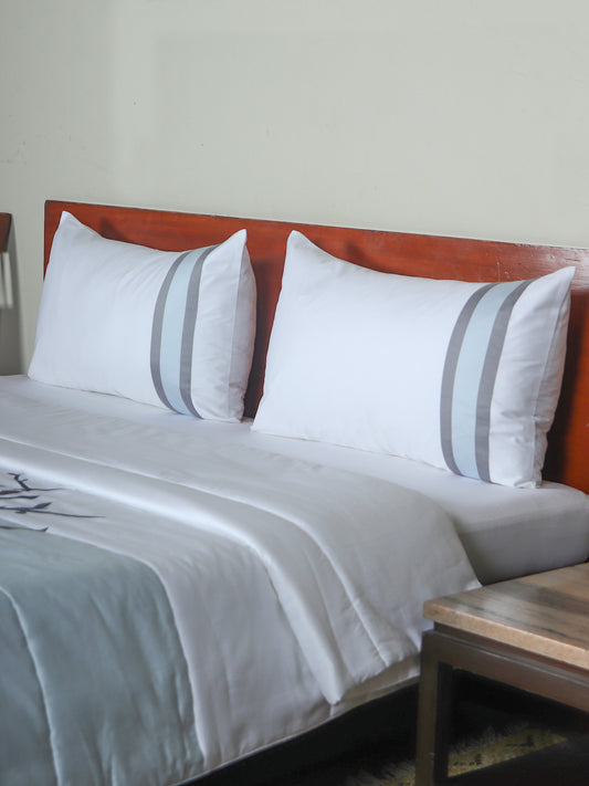 Grey blue colored embroidered bed quilt /comforter with 2 matching pillow covers made from polyester front and cotton backed quilt for king size double bed