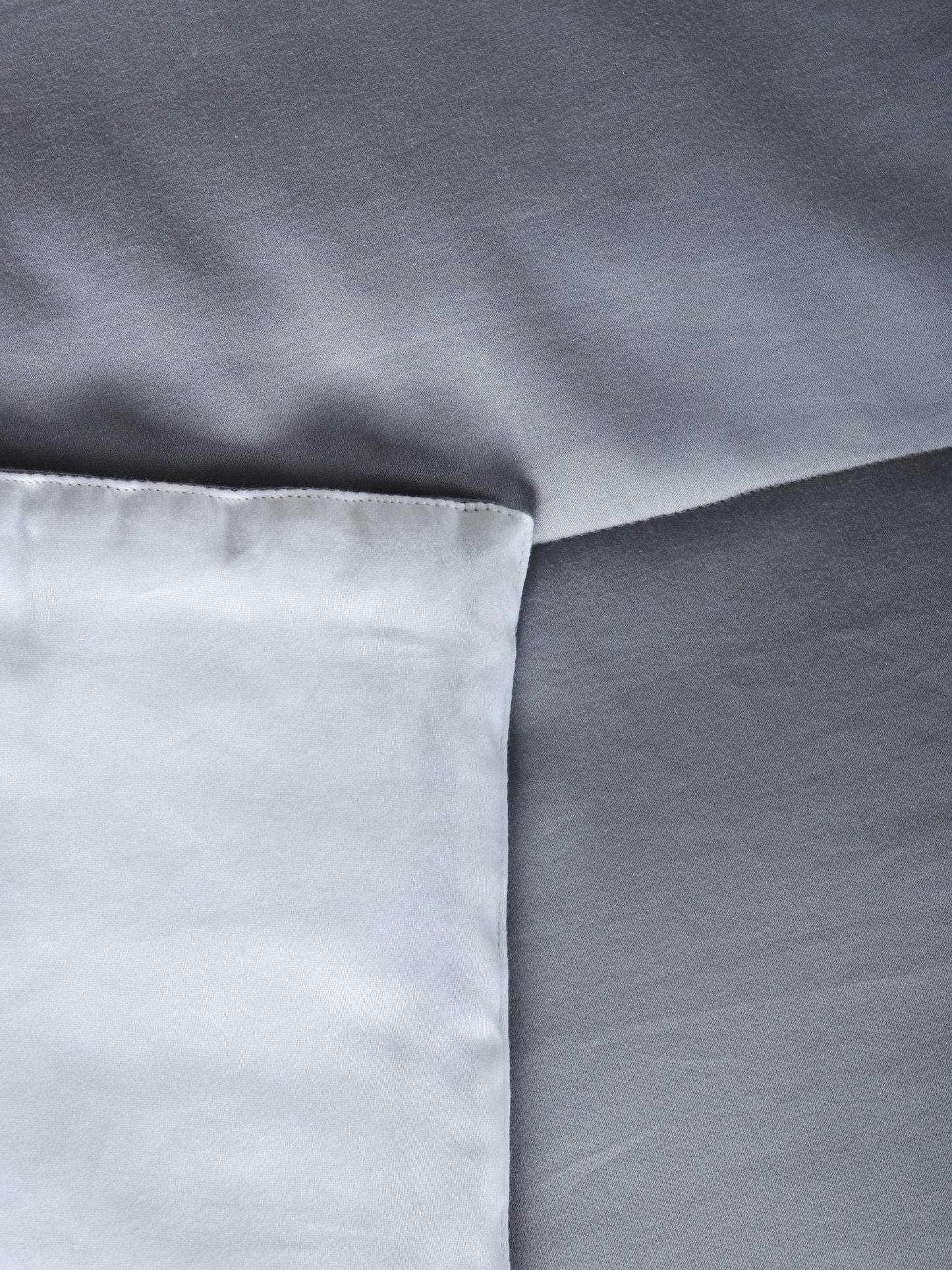 Grey blue colored embroidered bed quilt /comforter with 2 matching pillow covers made from polyester front and cotton backed quilt for king size double bed