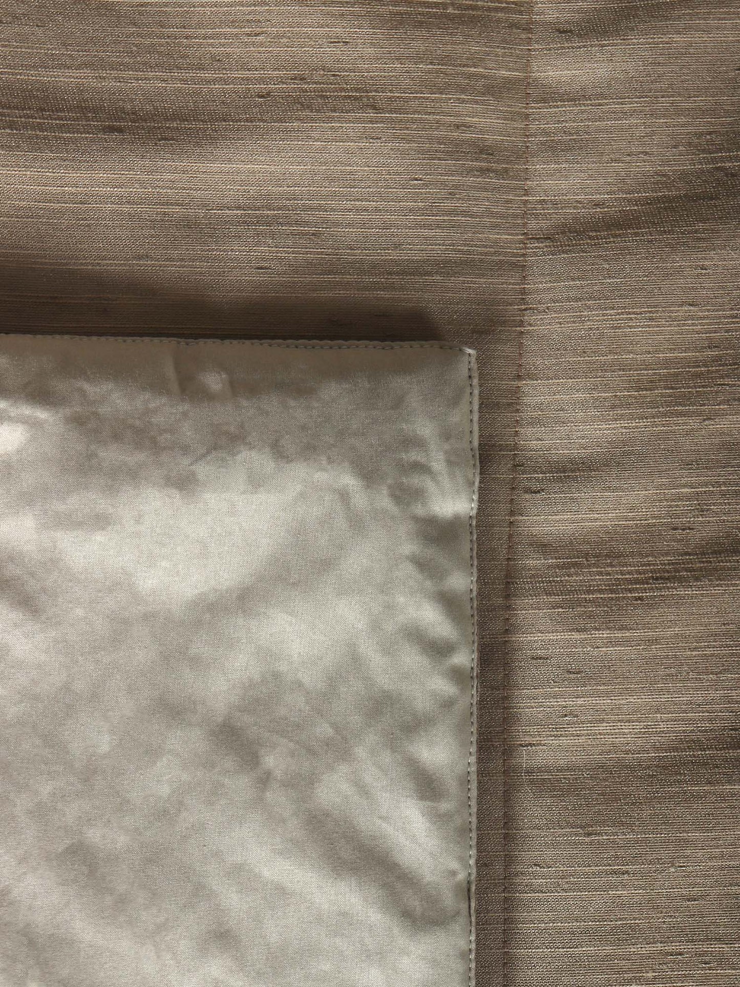 Beige colored bed quilt /comforter with 2 matching pillow covers made from polyester front and cotton backed quilt for king size double bed
