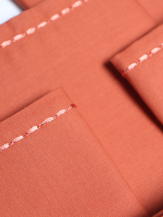 closeup of chawal taka hand embroidered set of 6 dinner napkins in dark coral color - 16x16 inch