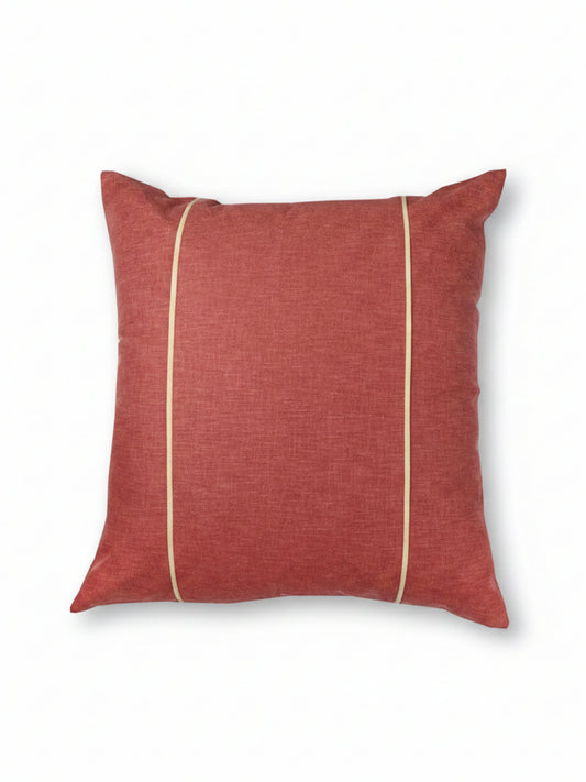 A square terracotta red throw pillow with two vertical gold stripes, shown with dimension arrows and labels indicating a 24 by 24 inch size.