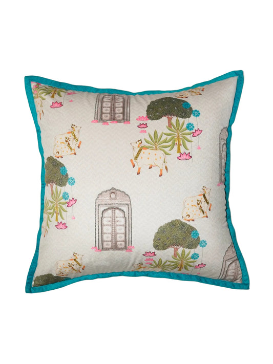 Decorative pillow with garden-themed design on a white background
