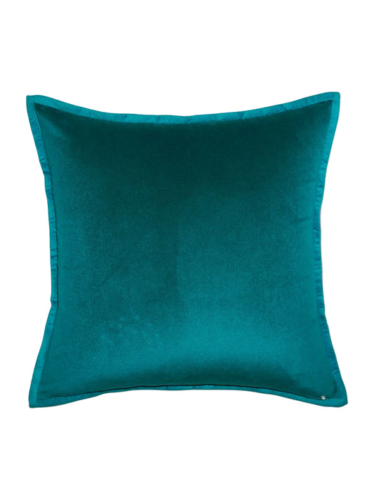A square teal velvet throw pillow with piped edges, shown against a plain off-white background.