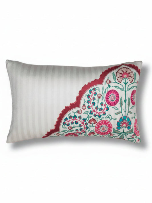Decorative pillow with floral pattern on a white background