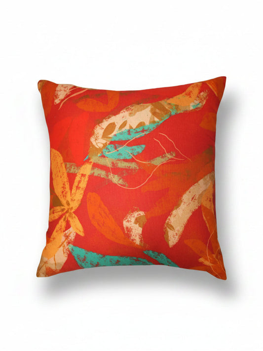 Decorative pillow with abstract design on a red background