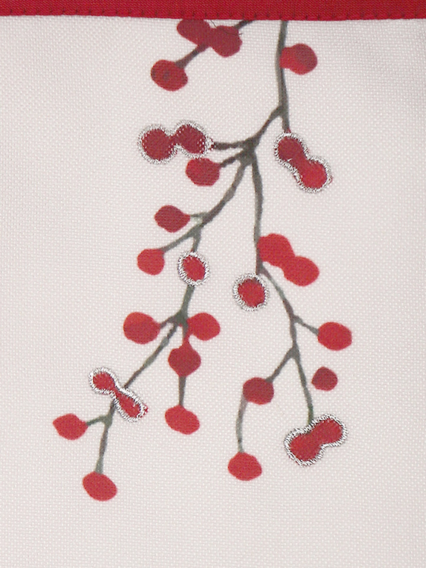 closeup of red and white floral embroidered placemats and napkins in contrast colors - 13x19inch