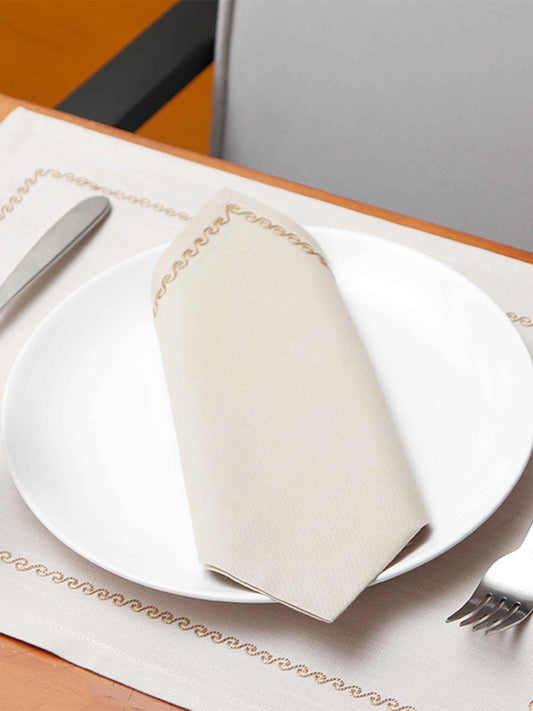 wavy pattern embroidered dinner table placemats and matching embroidered napkins in offwhite - 13x19 inch