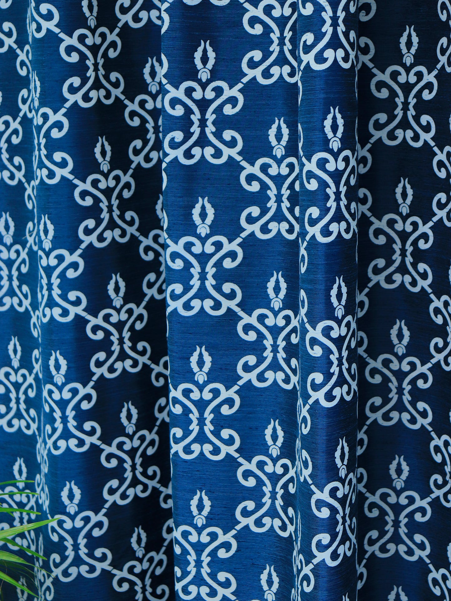 closeup of abstract printed door curtains on dark blue color with rod pocket - 7.5 feet, 52x90 inch