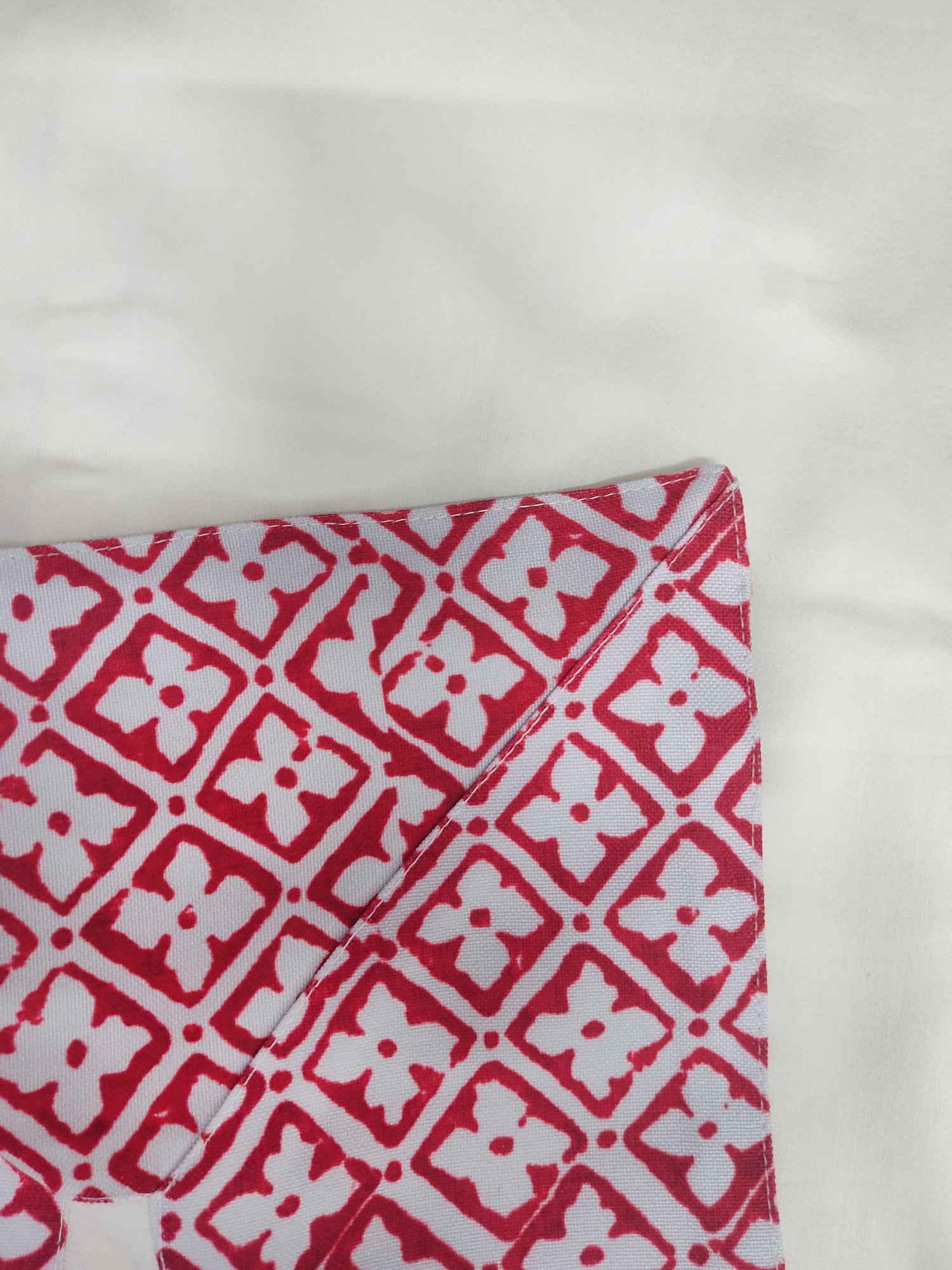 red and white colored printed Table cover with golden embroidery for 6 seater table 52x84 inches