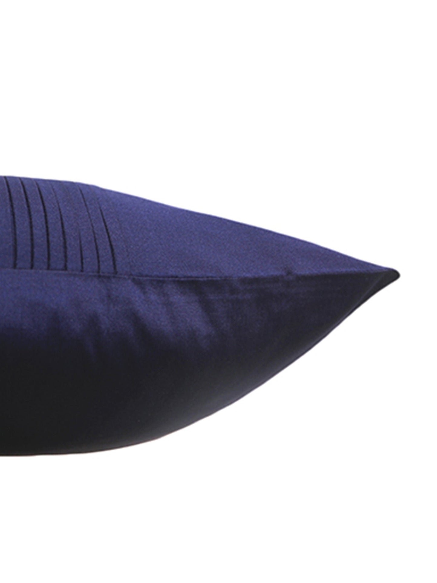 A close-up of a dark navy blue pillow with vertical pleats on the top edge, shown against a plain white background.