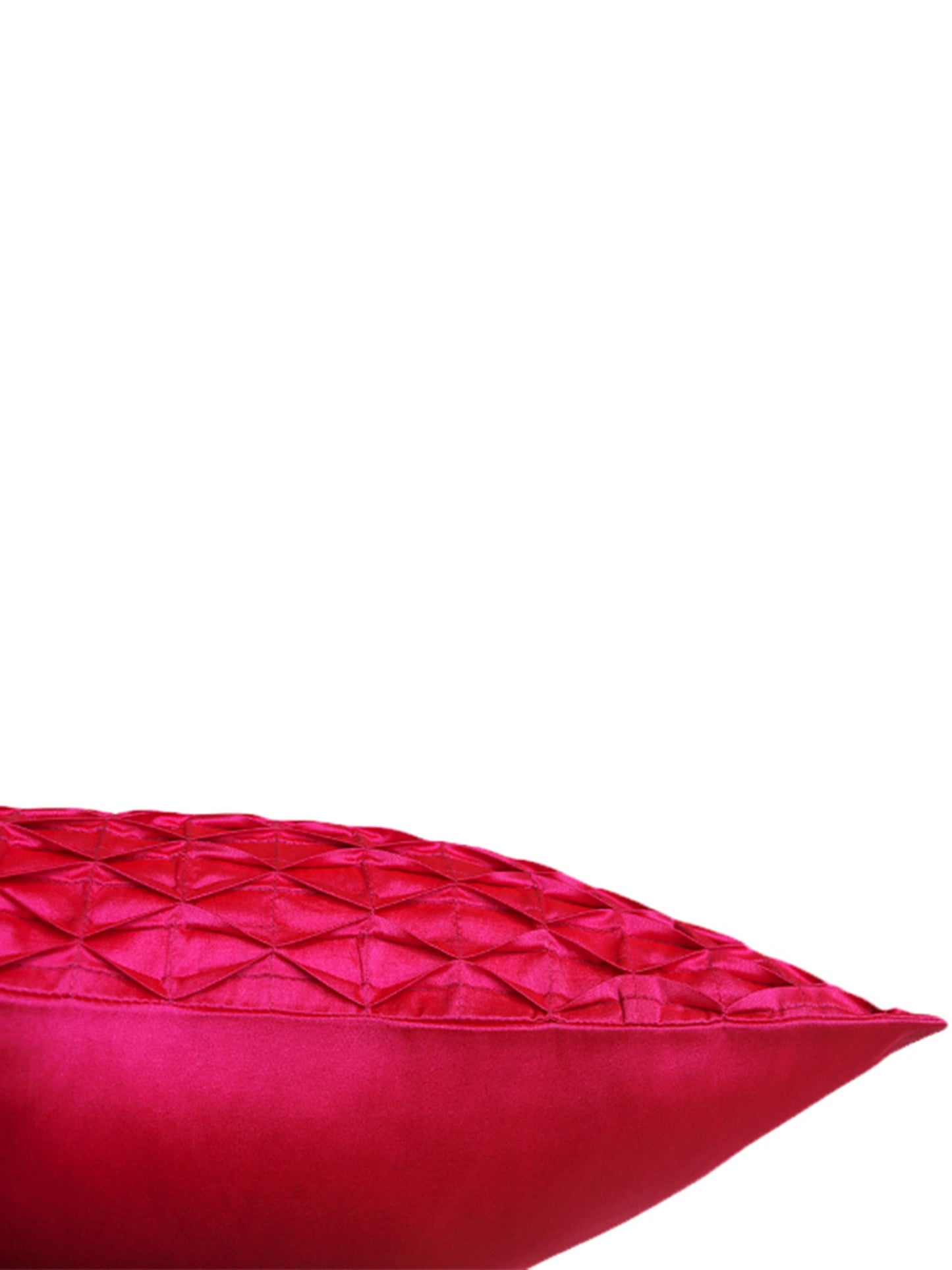 A close-up of a bright pink textured throw pillow with a geometric diamond-quilted pattern on a solid white background.