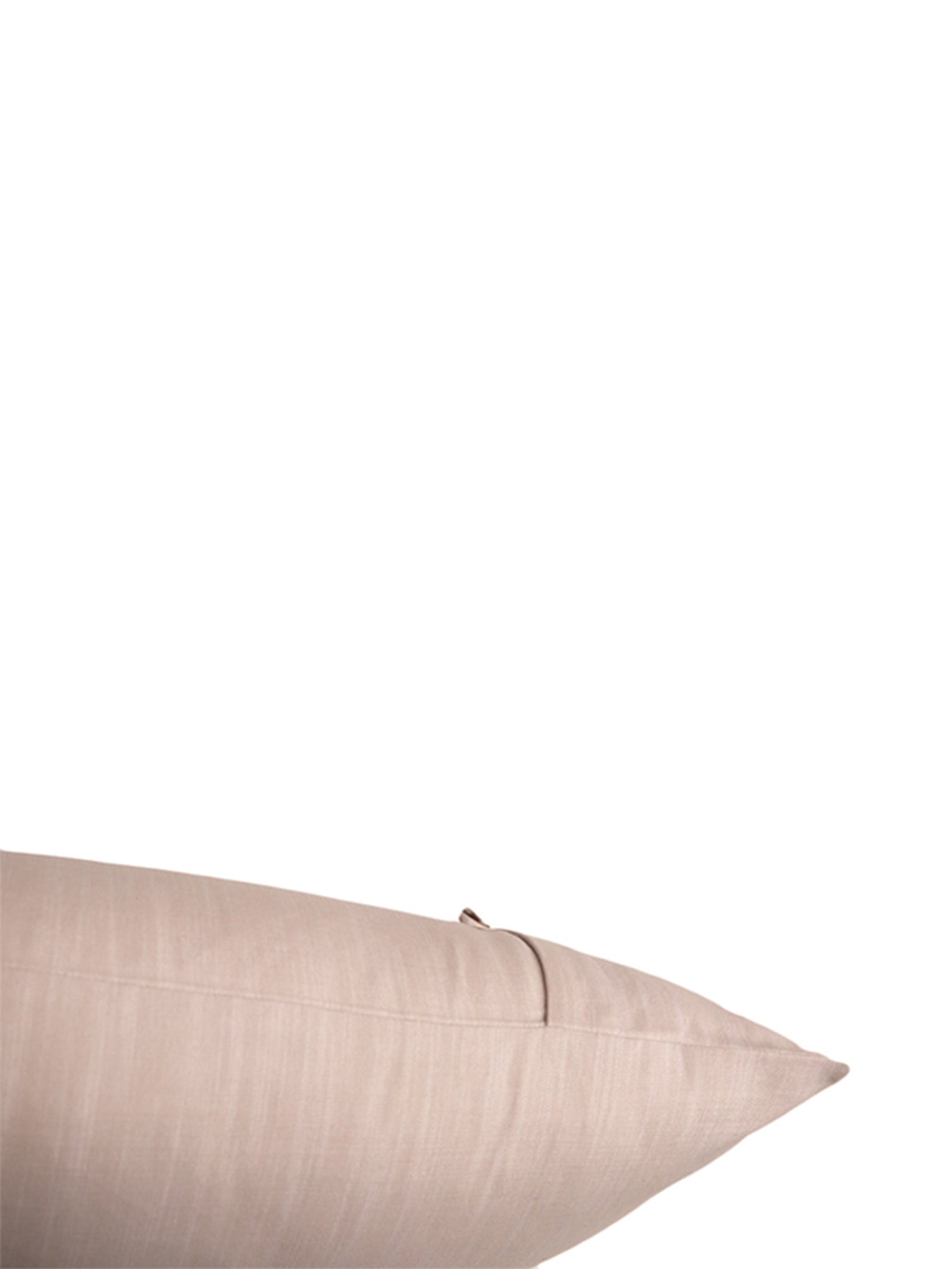 A close-up of a light beige textured throw pillow against a solid white background.