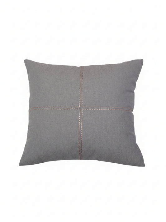 A square gray throw pillow with a textured linen-like fabric, featuring a central cross design formed by two intersecting stitched lines in a contrasting light brown color, shown against a plain white background.