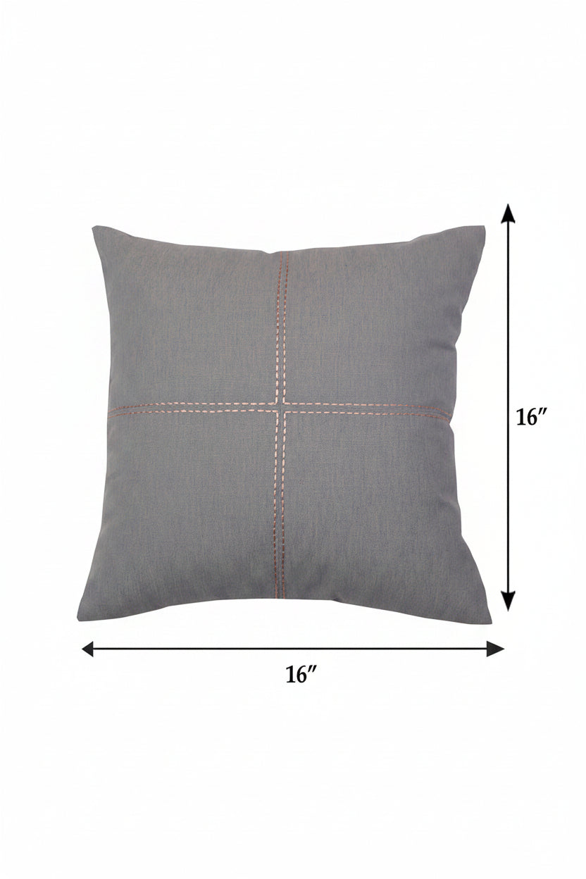 A square gray throw pillow with a textured fabric surface and a cross-shaped decorative stitching design in the center, shown with dimension arrows indicating a 16 by 16 inch size.