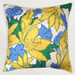 Decorative pillow with yellow and blue floral pattern on a white background