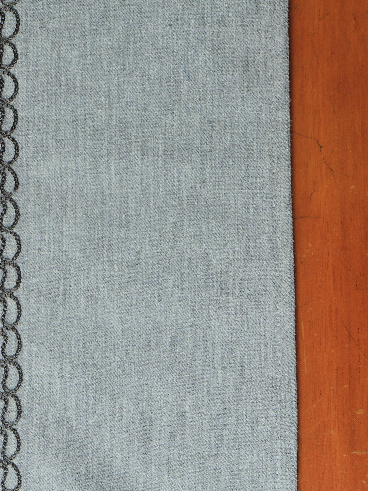 gray colored embroidered table runner for 6 seater table - 52x84 inches.