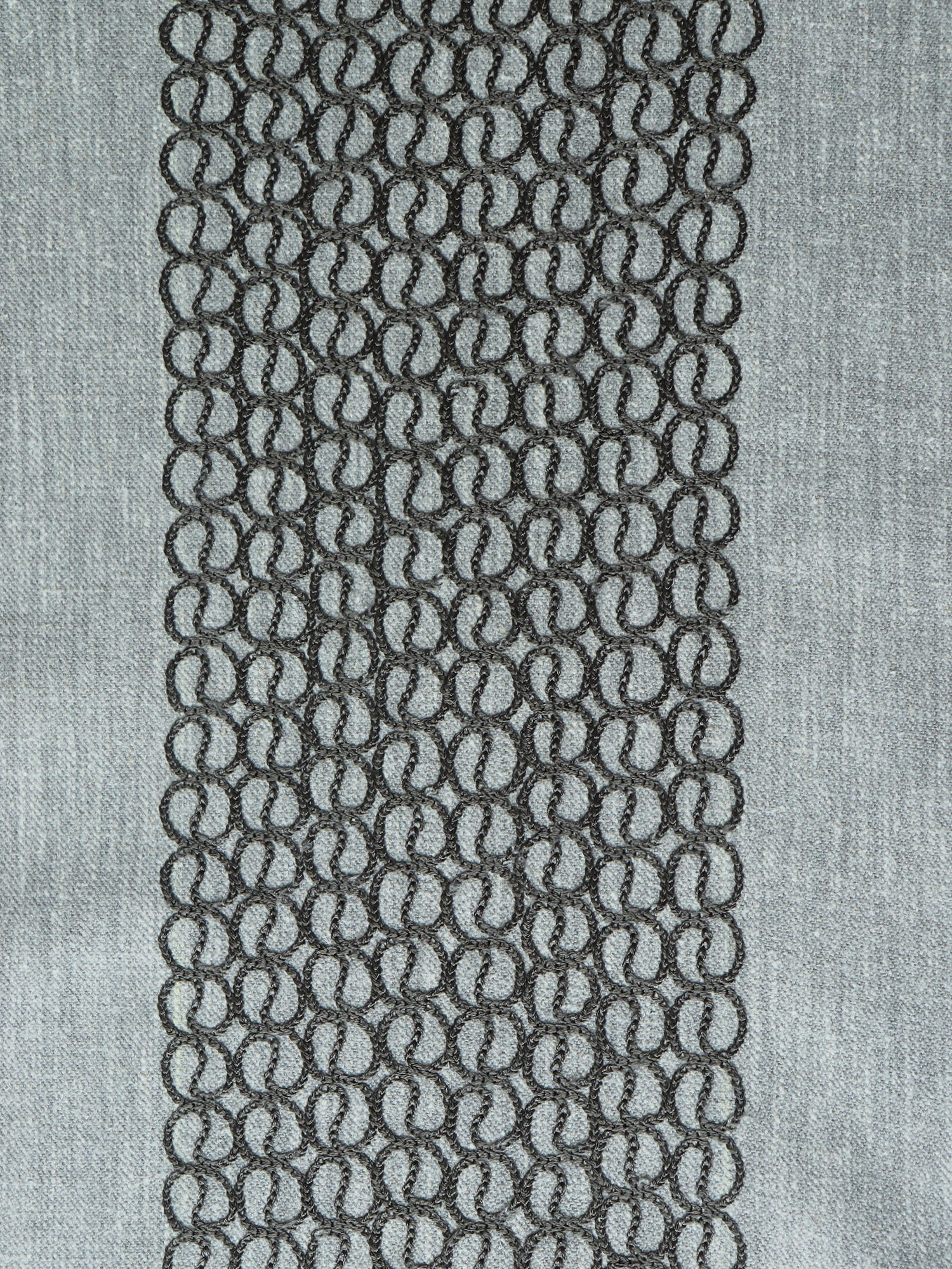 closeup of gray colored embroidery on table runner for 6 seater table - 52x84 inches.